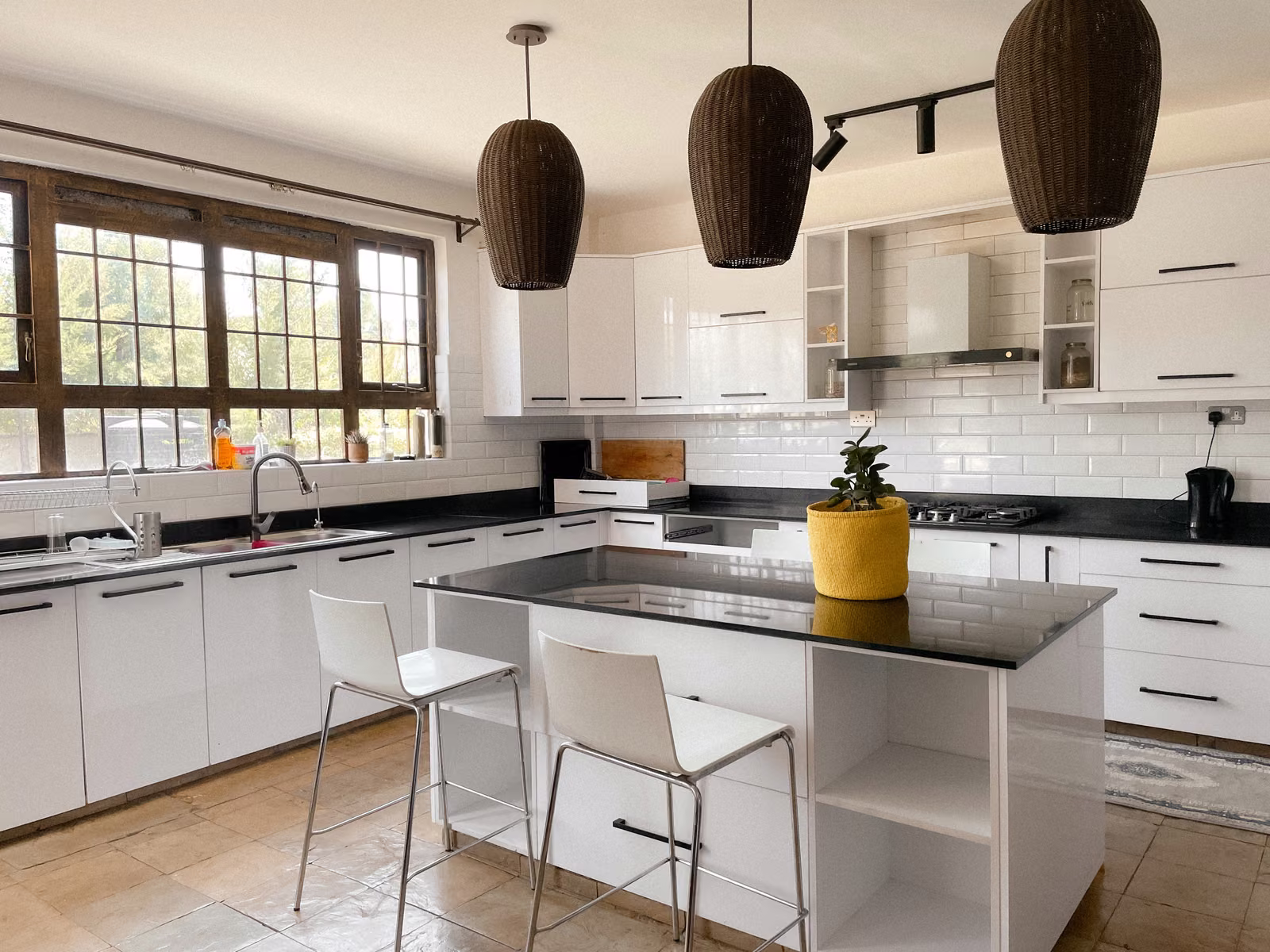 The kitchen, with island and breakfast bar
