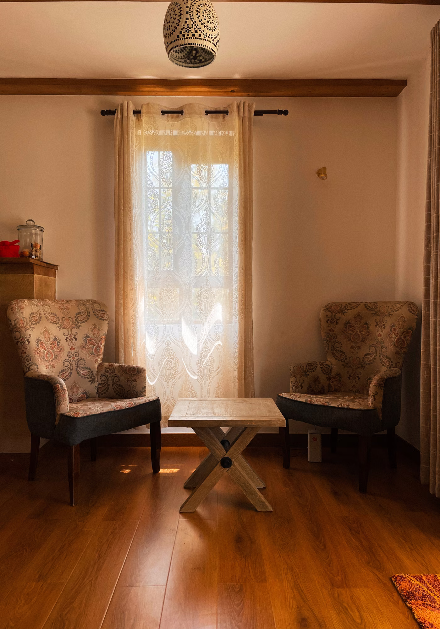 A sunlit seating corner by the window